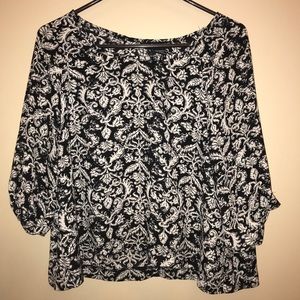 Black patterned top.